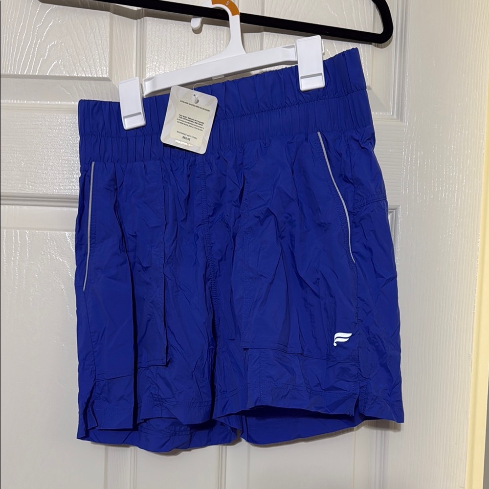 Ultra high waisted, piped nylon shorts